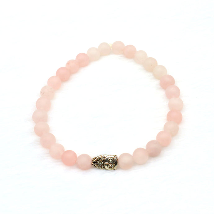 Circle bracelet with different pink coloured rose quartz gemstone beads with silver owl charm