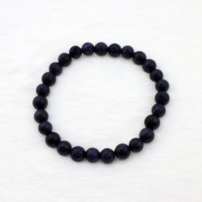 Circle bracelet with sparkly dark blue sandstone gemstone beads