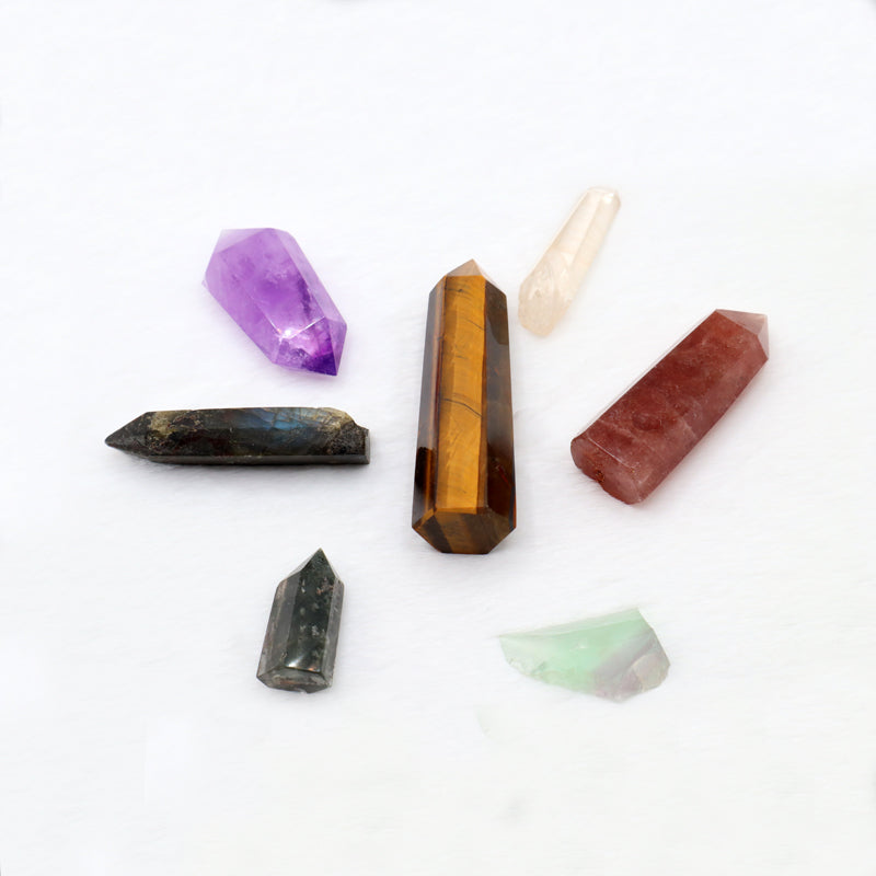 Clockwise direction - Amethyst purple raw crystal, Clear Quartz raw crystal, Raspberry Quartz raw crystal tower, Fluorite raw crystal, Lodalite raw crystal small tower, Labradorite raw crystal tower. The middle is Tigers Eye raw crystal tower 