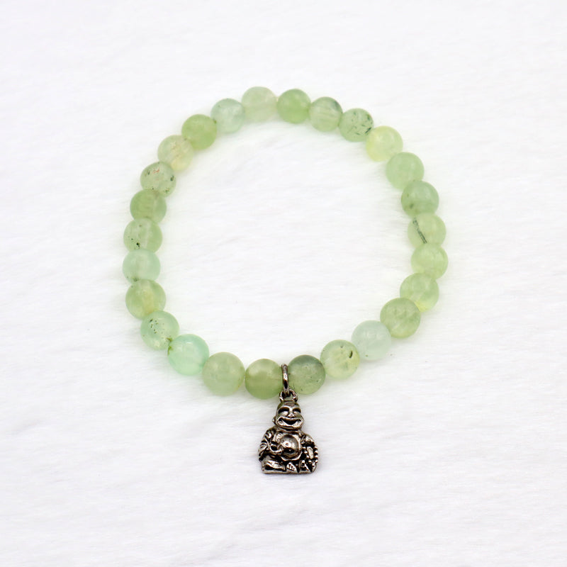 Circle bracelet with green coloured periodt gemstone beads with a full body silver buddha charm